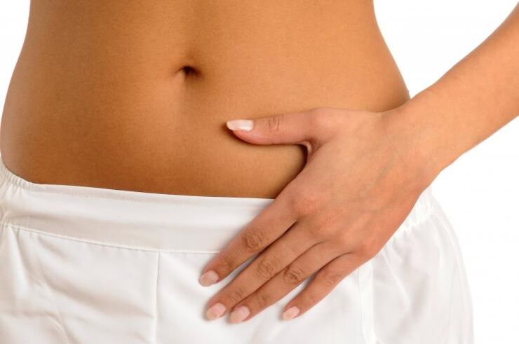 douleur dans le bas de l'abdomen comme symptôme de cystite chez la femme